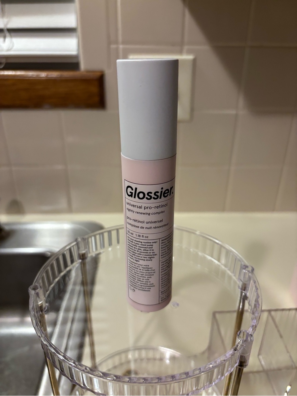 Glossier Pale Pink Serum Bottle with White Cap